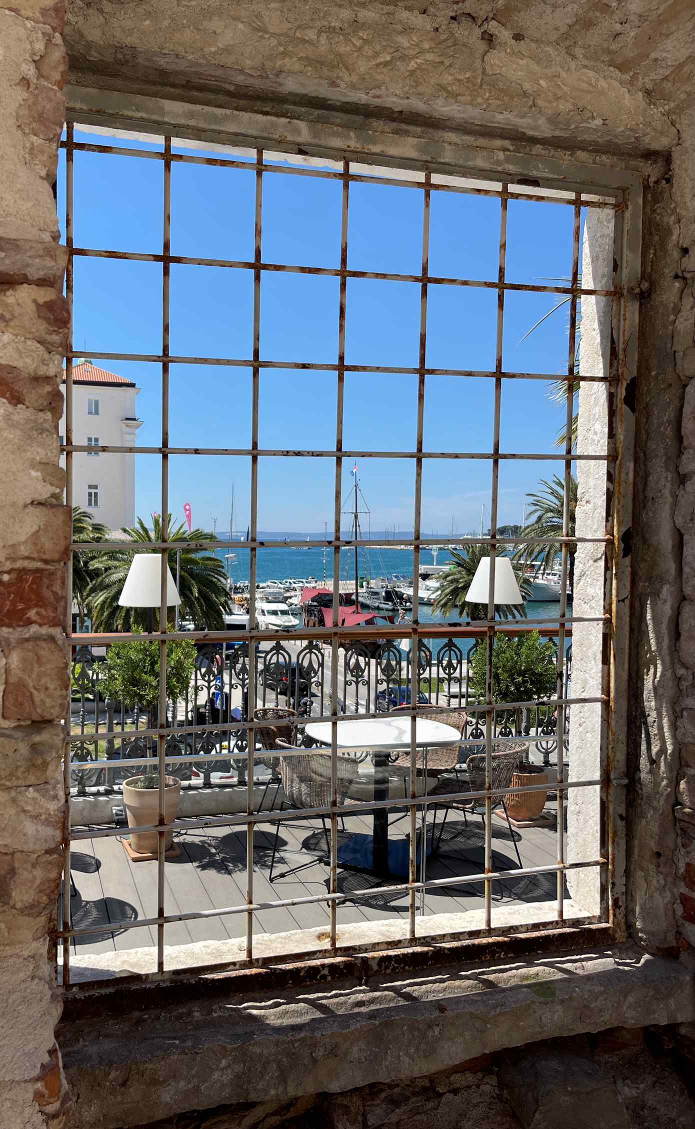 View from a window in Diocletian's Palace to the harbor and main street in Split
